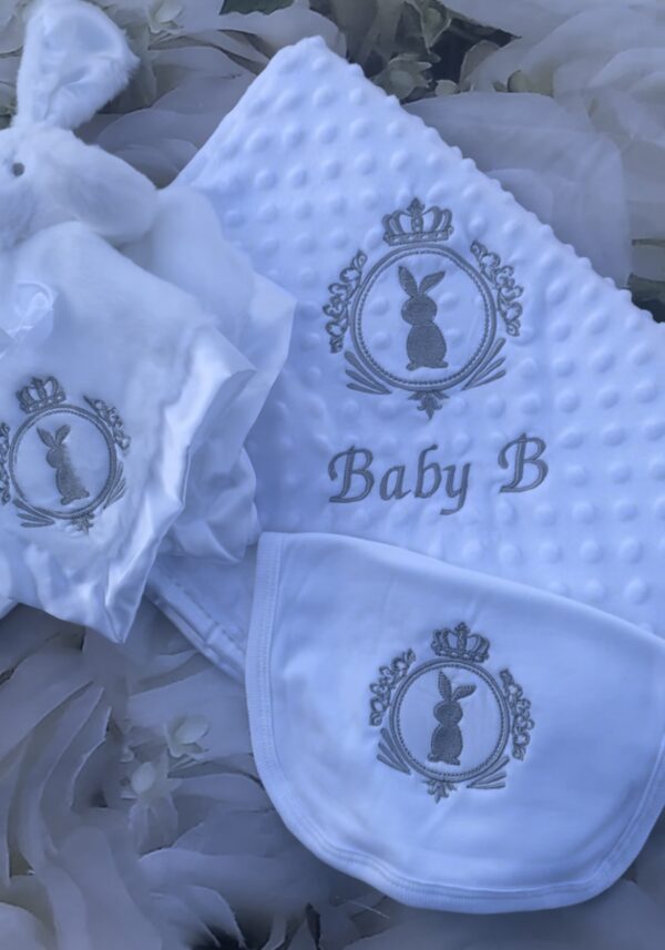 White with silver grey embroidery with a comforter and bib